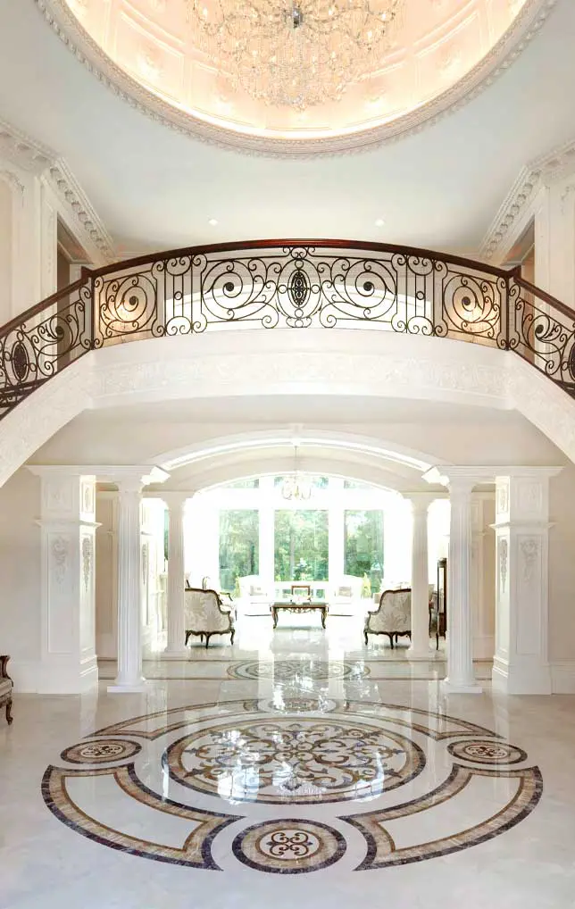 moda-contemporary-marble-inlay-foyer Contemporary foyer featuring a marble floor with a geometric inlay design.